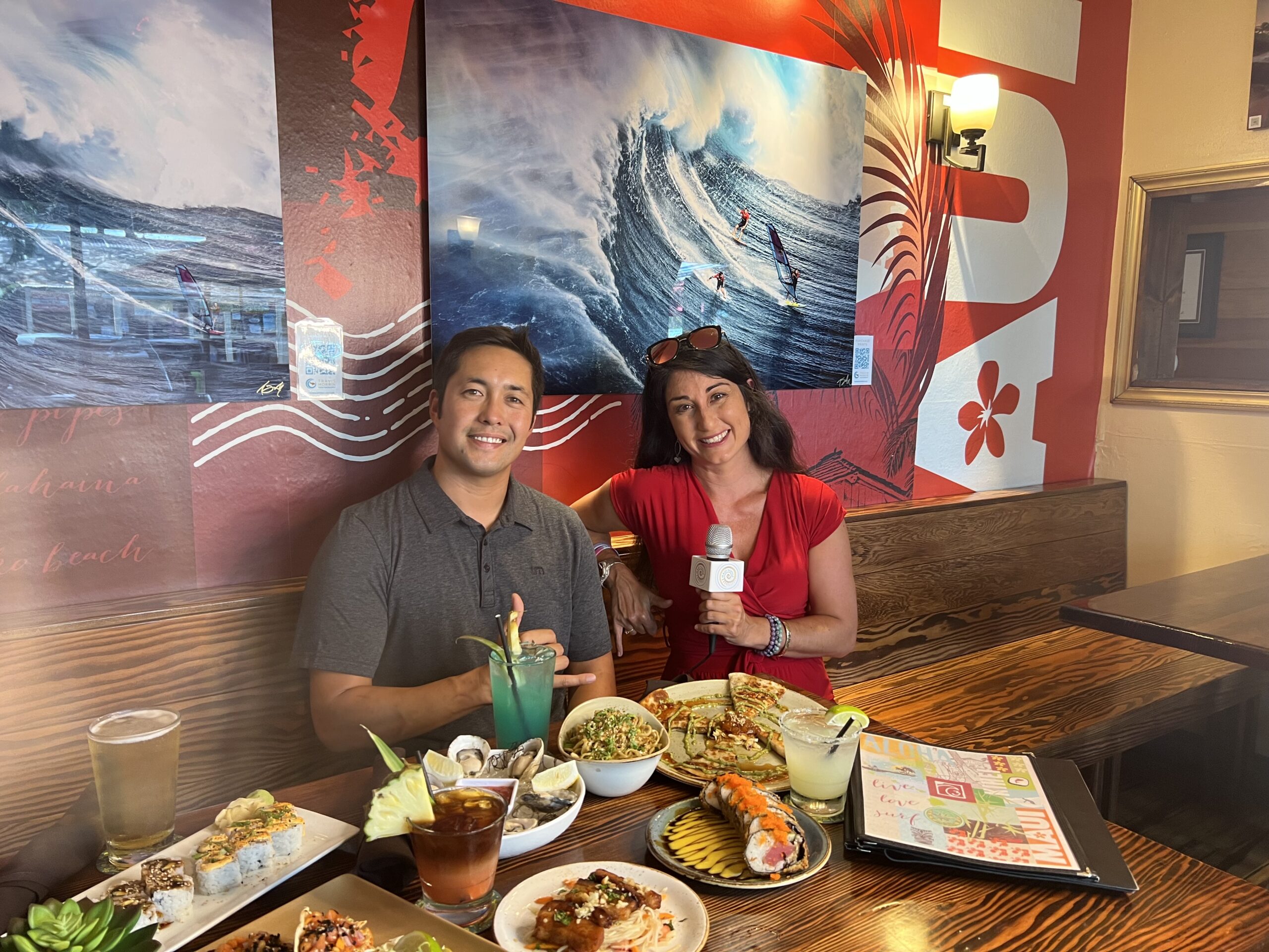 Three's co-owner/chef Travis Morrin and Maui Inspired host Kiaora Bohlool with Happy Hour food and drinks